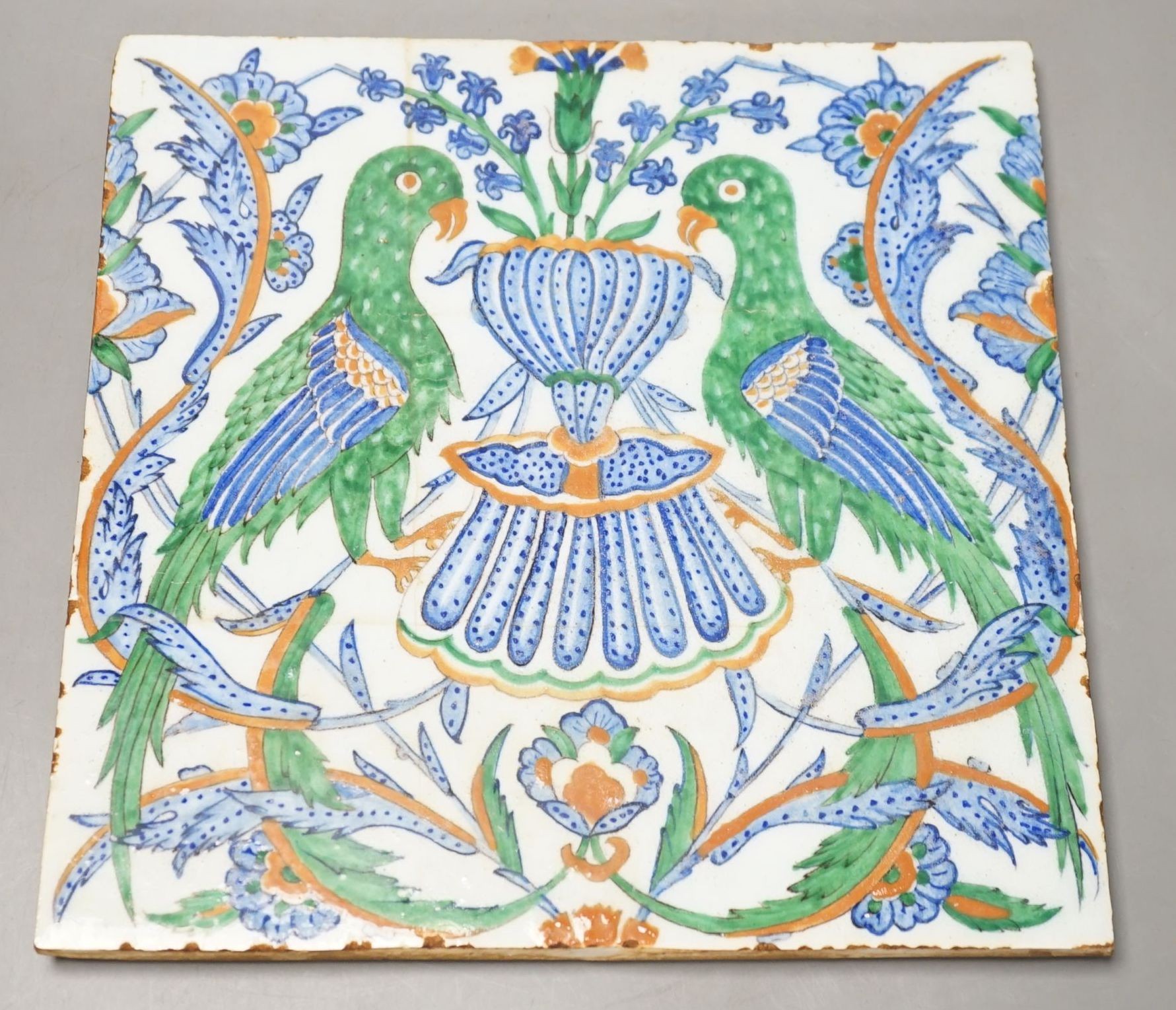 A large Iznik tile, 25 cms x 25 cms